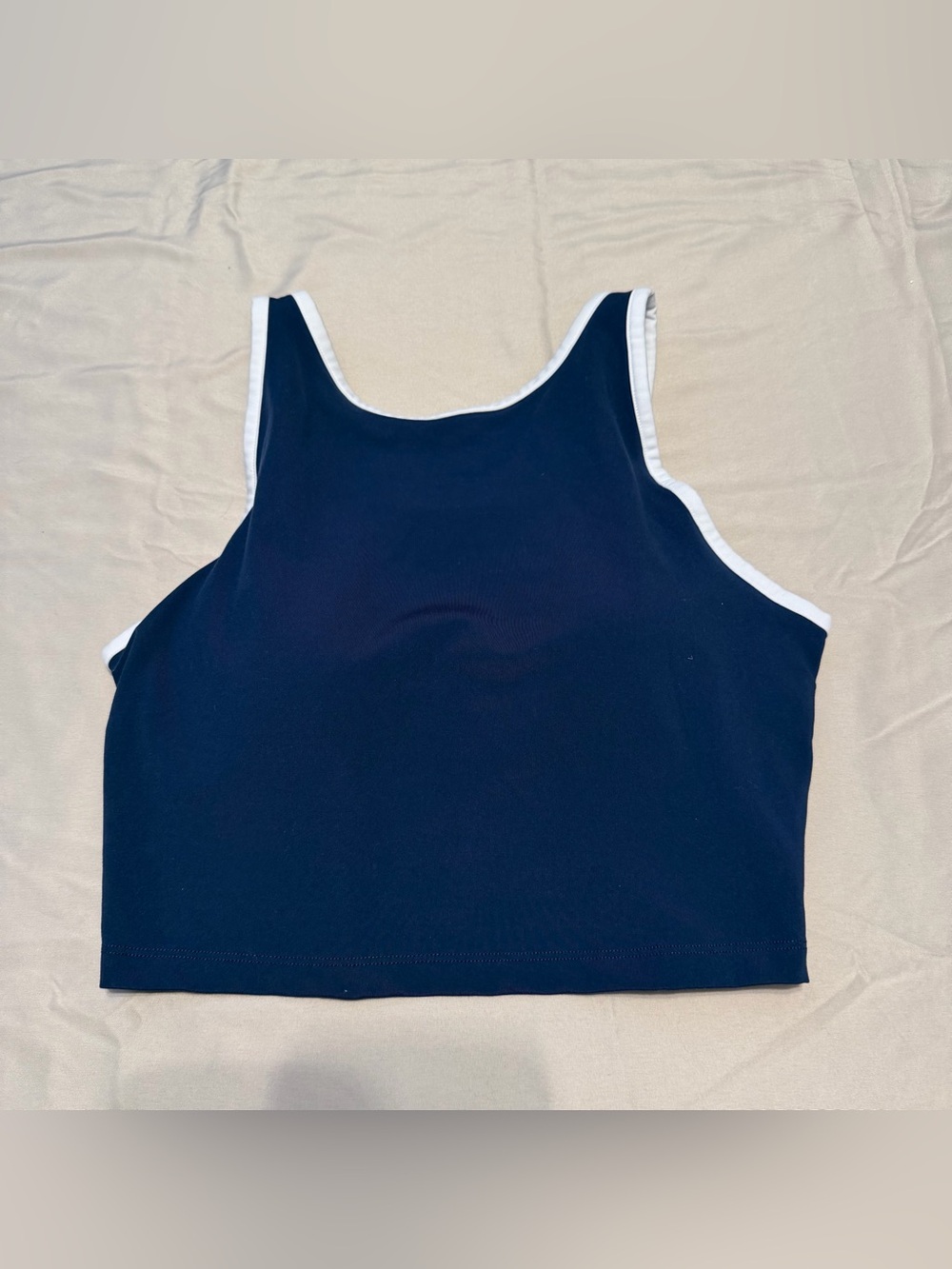 Navy sports bra  with White Trim small yogalicious‎